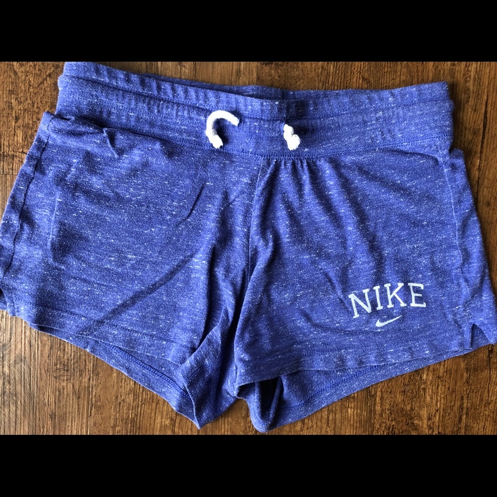 Purple Nike shorts